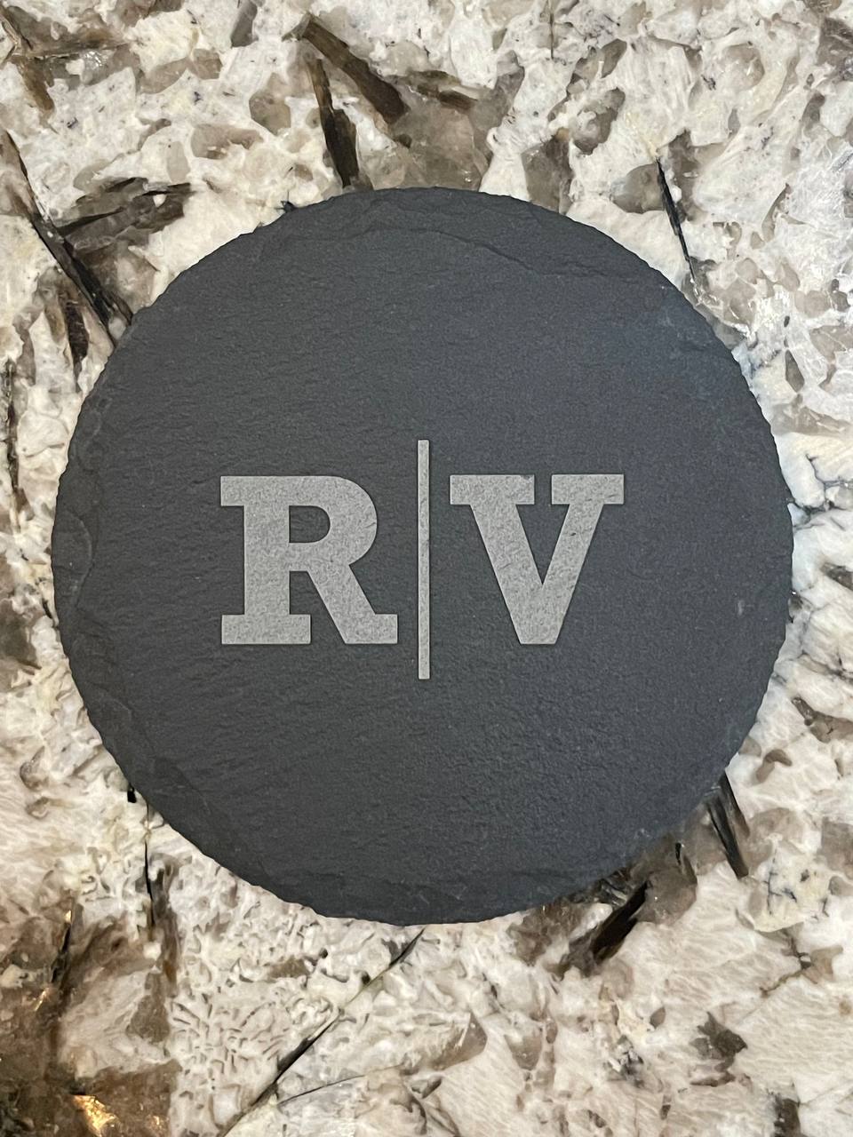 Slate coaster engraved with a monogram